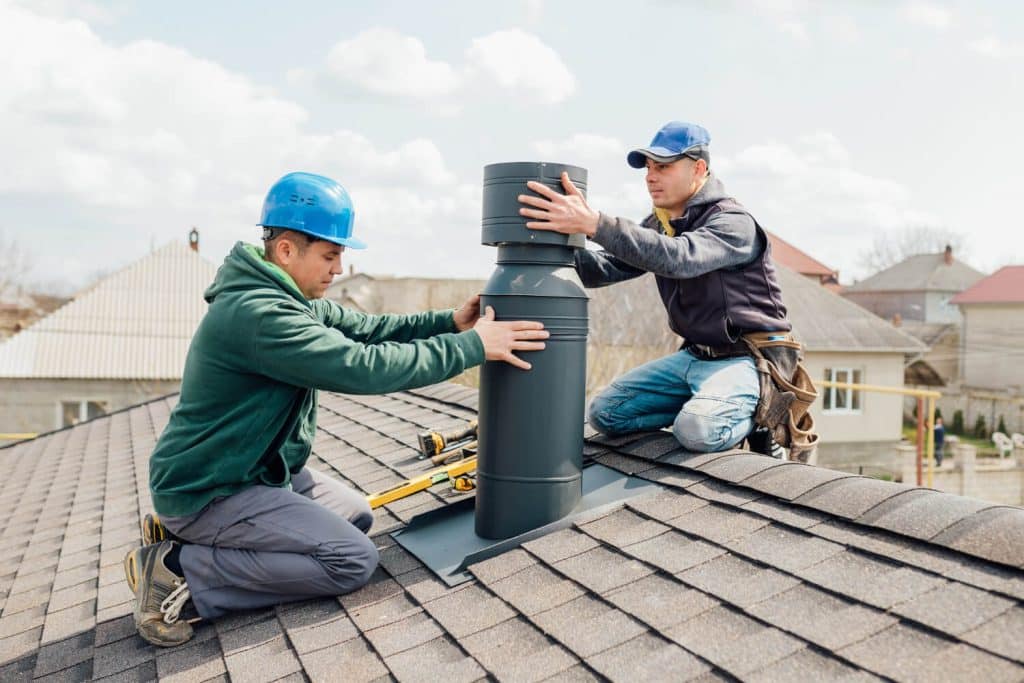 Workers from chimney services denver